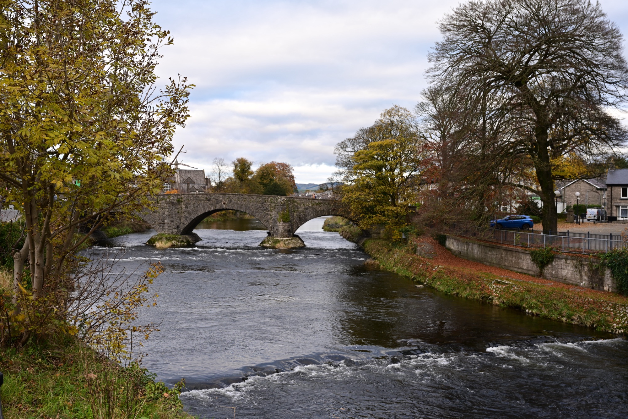 Stone bridge over the River Kent, Kendal, in autumn